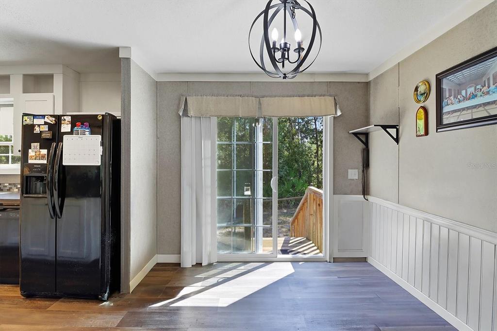 4801 North Mattox Point Crystal River, FL 34428 - Photo 21 of 46 a view of a livingroom with furniture and window