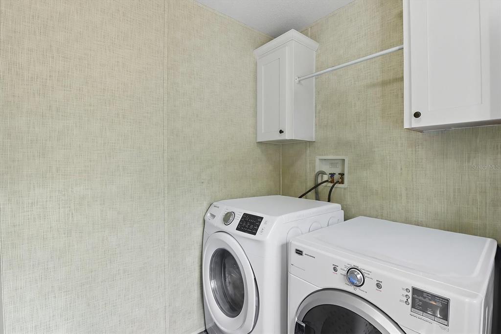 4801 North Mattox Point Crystal River, FL 34428 - Photo 23 of 46 a utility room with dryer and washer