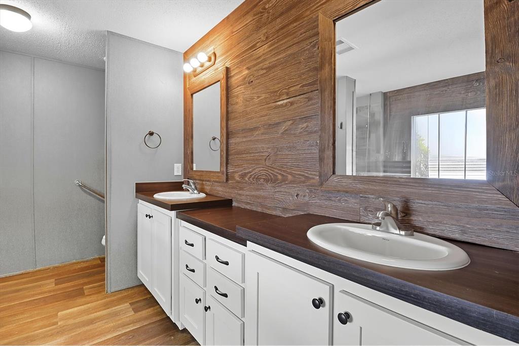 4801 North Mattox Point Crystal River, FL 34428 - Photo 25 of 46 a bathroom with a sink and a mirror