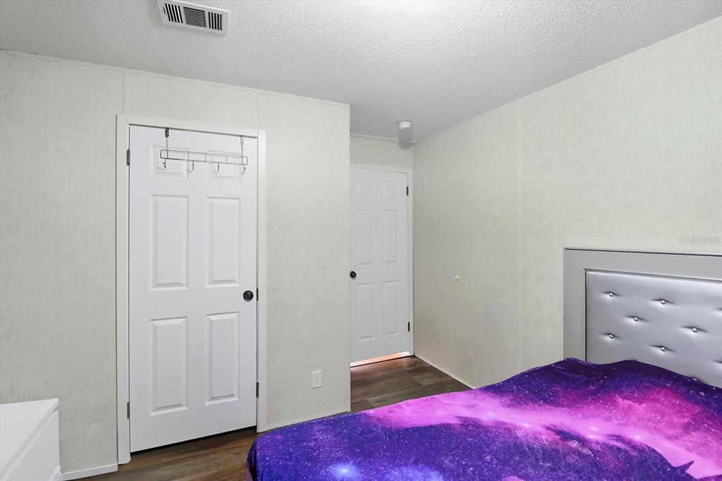 4801 North Mattox Point Crystal River, FL 34428 - Photo 29 of 46 a bedroom with a bed and a window