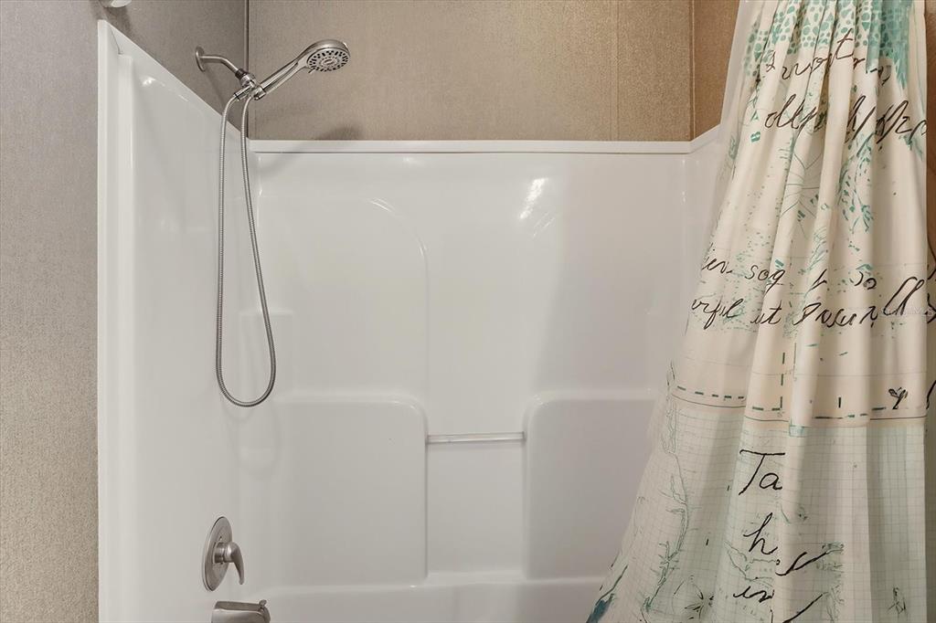 4801 North Mattox Point Crystal River, FL 34428 - Photo 31 of 46 a bathroom with a glass shower door