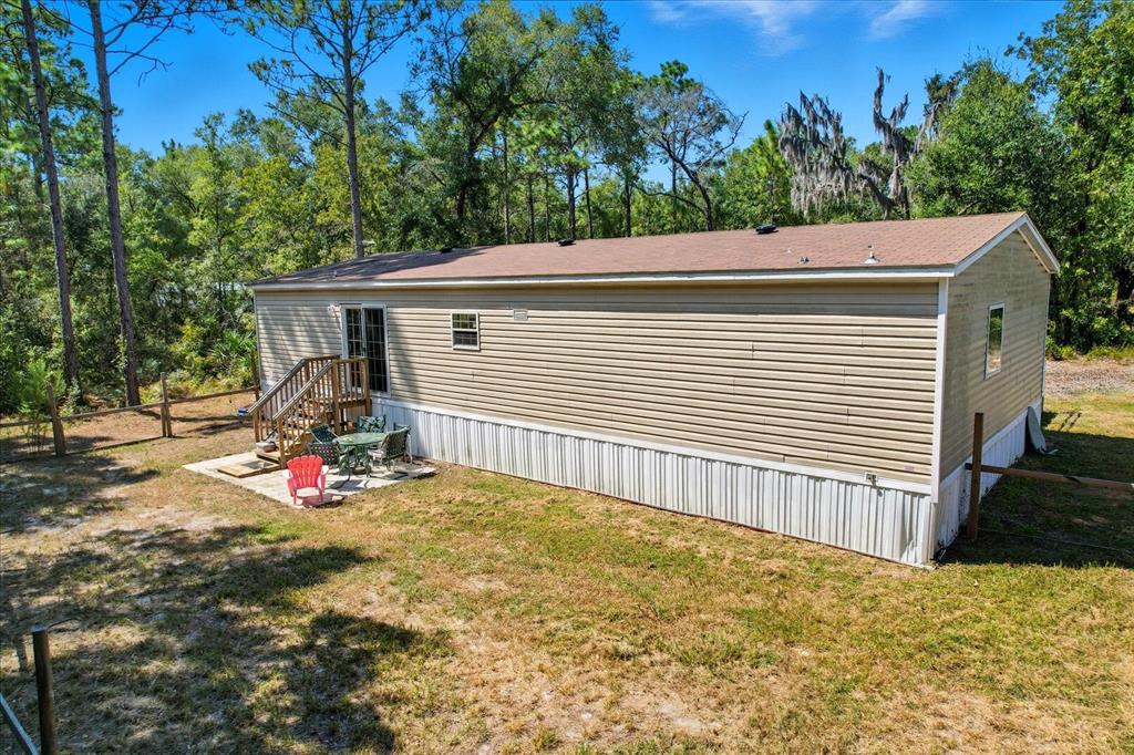 4801 North Mattox Point Crystal River, FL 34428 - Photo 38 of 46 a view of a back yard of the house