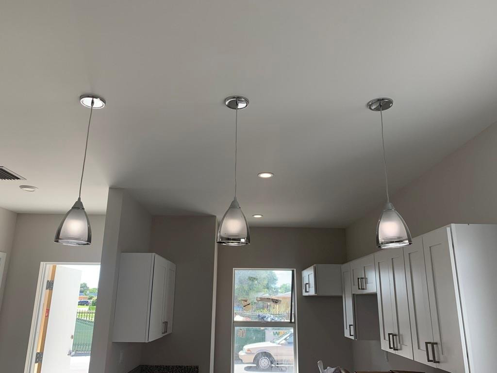 309 Foster Road, Unit 7 Hallandale Beach, FL 33009 - Photo 15 of 53 a view of a kitchen with a refrigerator