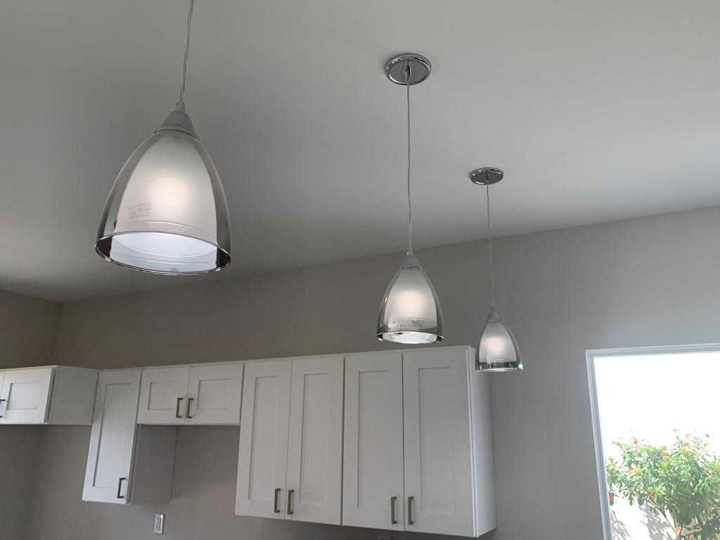 309 Foster Road, Unit 7 Hallandale Beach, FL 33009 - Photo 24 of 53 a view of a room with a ceiling fan and a window