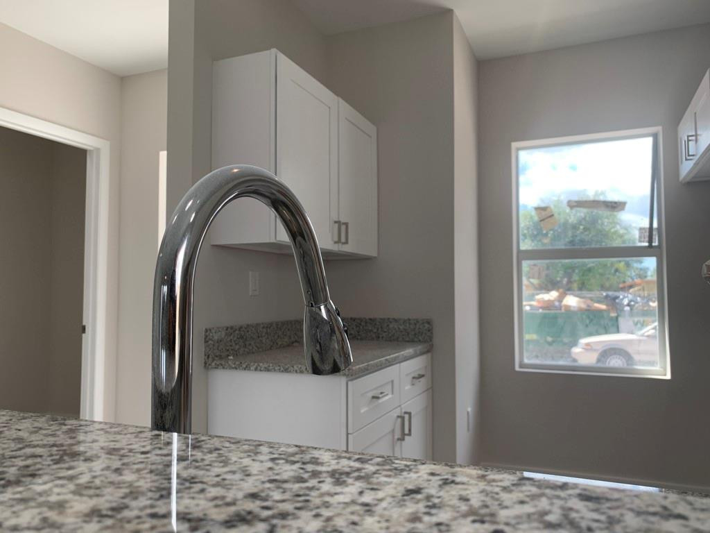 309 Foster Road, Unit 7 Hallandale Beach, FL 33009 - Photo 26 of 53 a view of a kitchen counter space and staircase