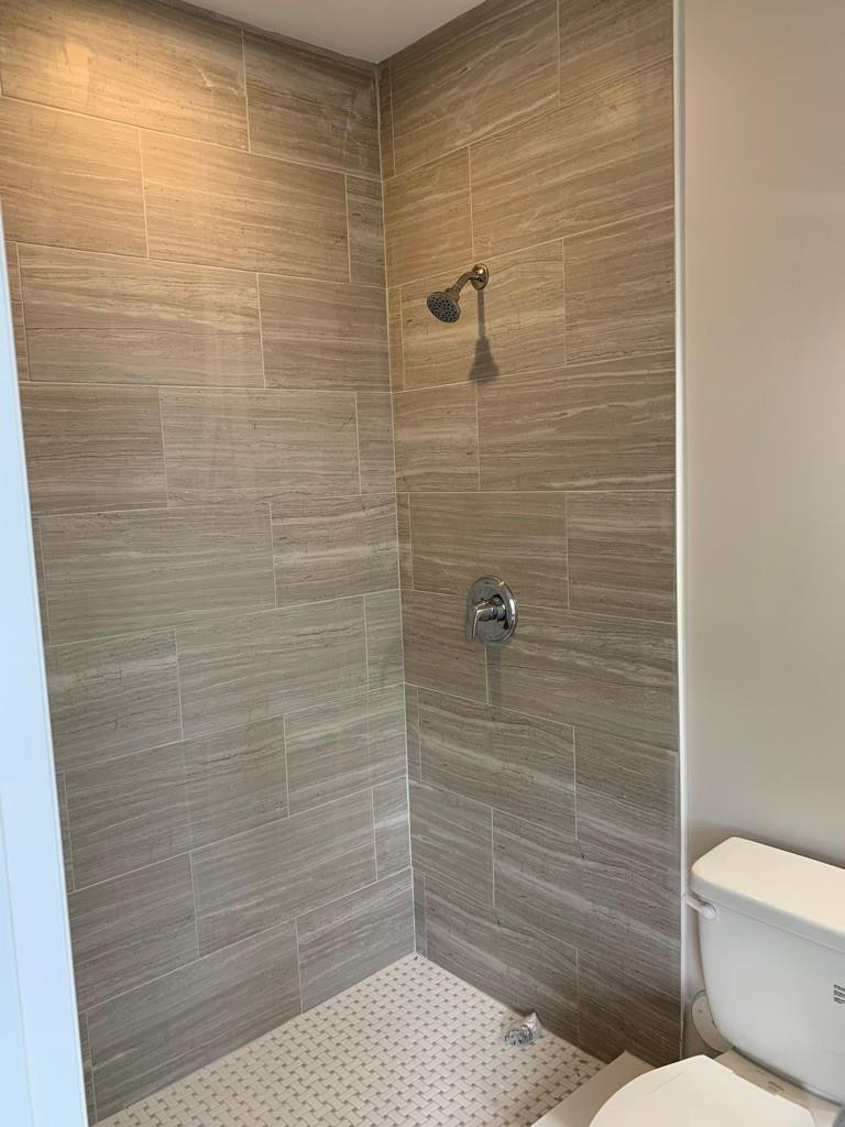 309 Foster Road, Unit 7 Hallandale Beach, FL 33009 - Photo 33 of 53 a bathroom with a toilet