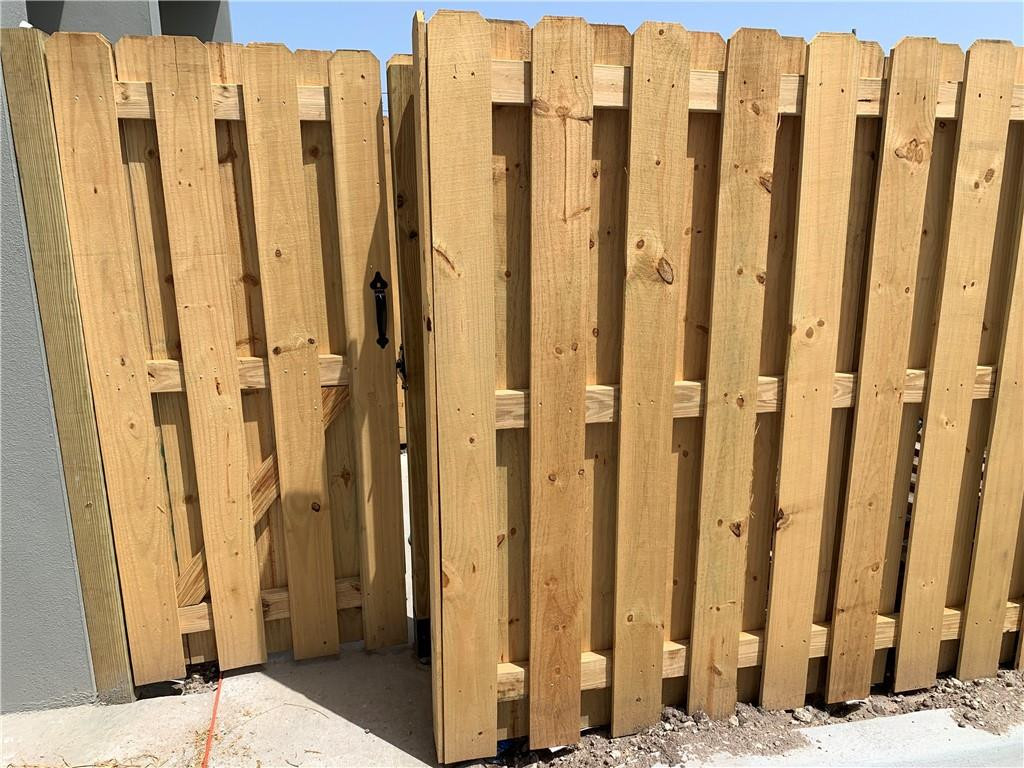 309 Foster Road, Unit 7 Hallandale Beach, FL 33009 - Photo 52 of 53 a view of wooden door with chairs