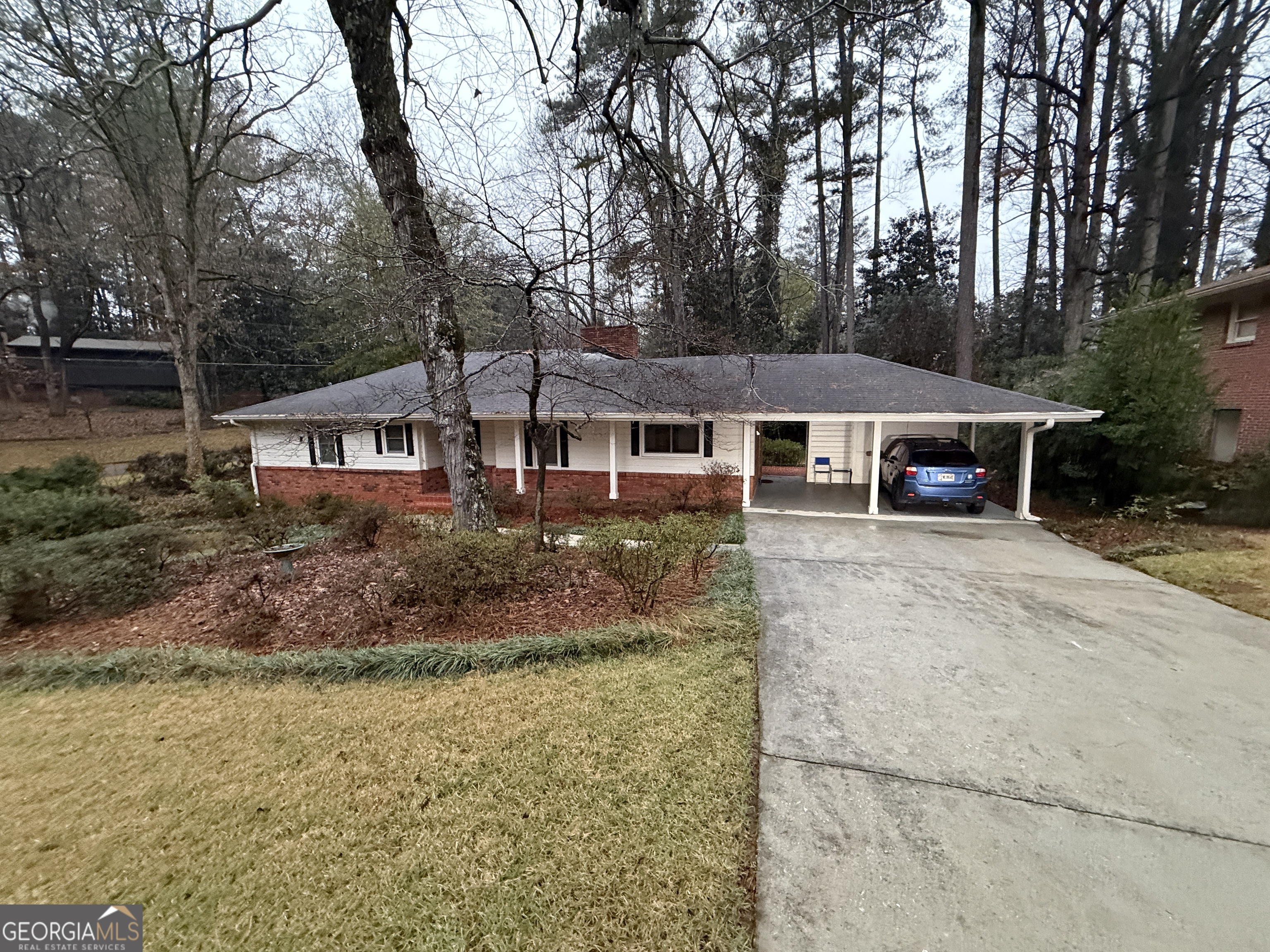 2352 Leafmore Drive Decatur, GA 30033 - Photo 16 of 28 front view of a house with a yard and an trees