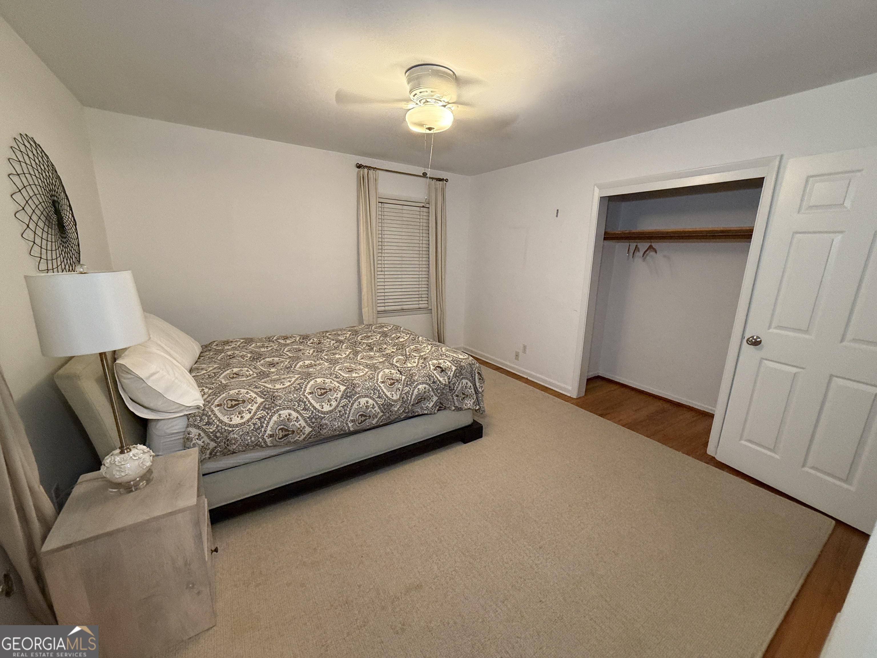 2352 Leafmore Drive Decatur, GA 30033 - Photo 24 of 28 a bedroom with a bed and a couch