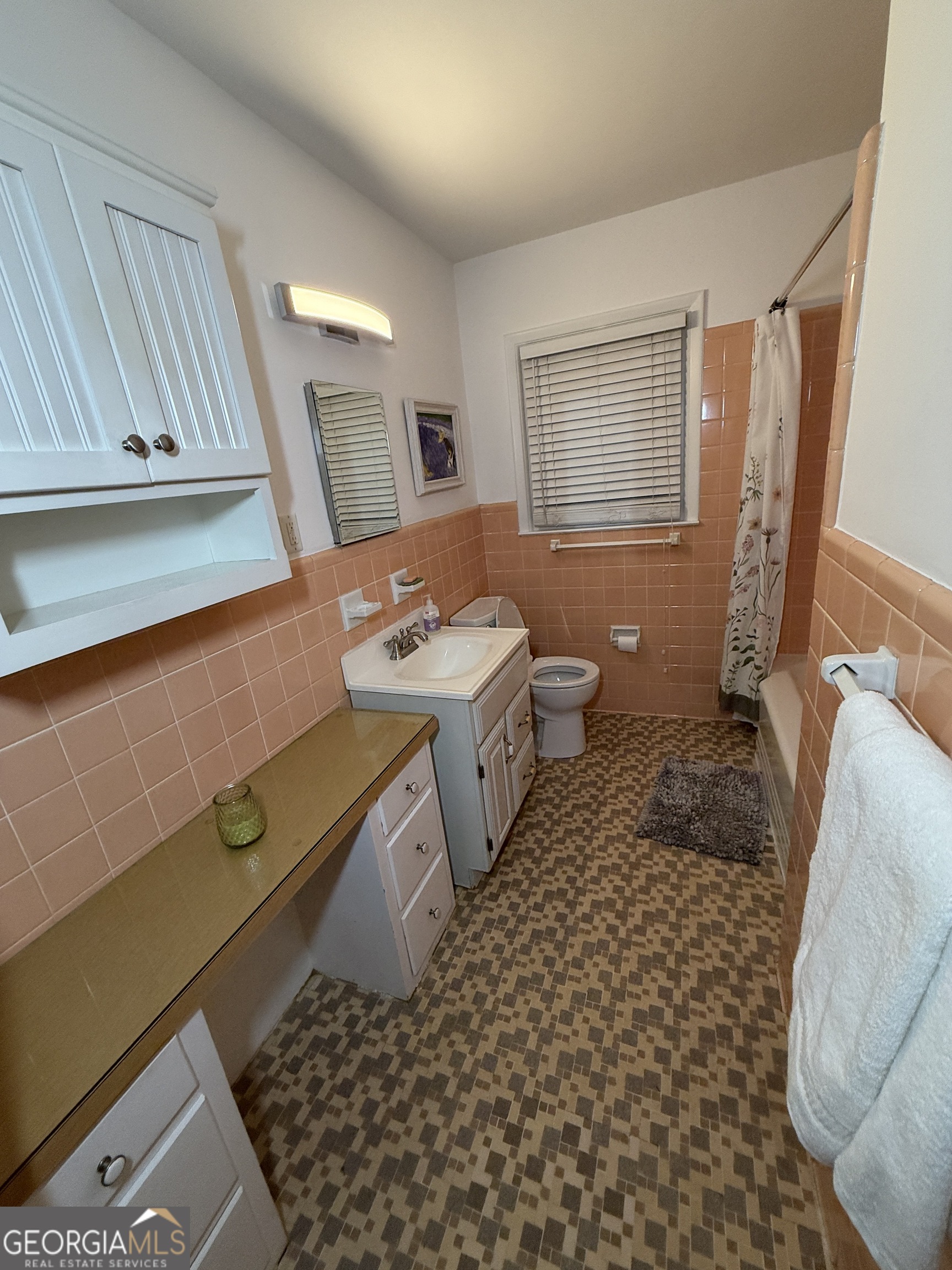 2352 Leafmore Drive Decatur, GA 30033 - Photo 27 of 28 a bathroom with a sink toilet and shower