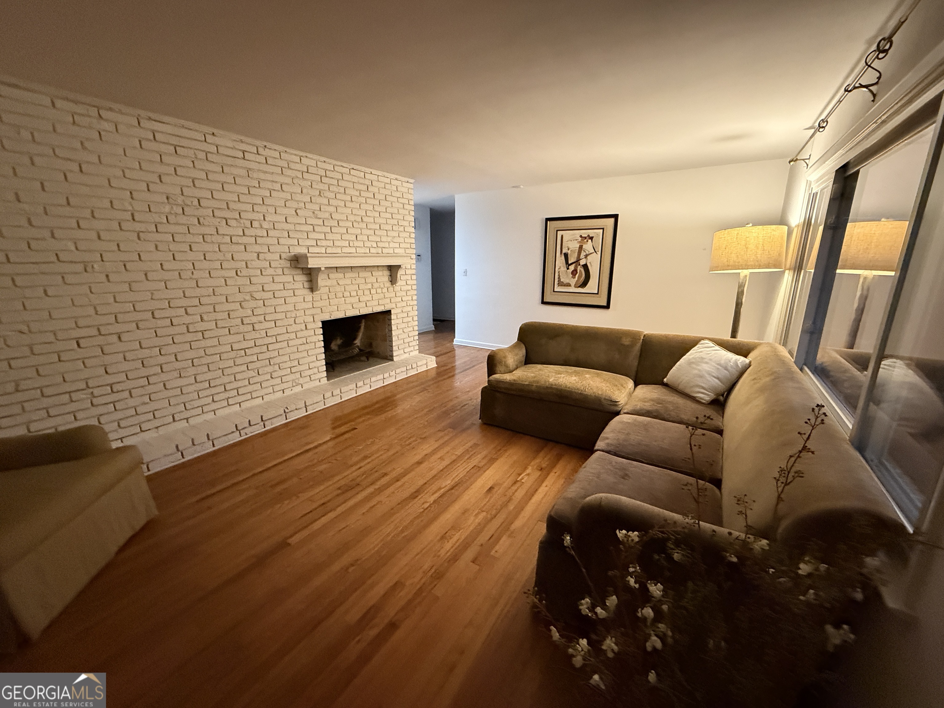 2352 Leafmore Drive Decatur, GA 30033 - Photo 8 of 28 a living room with furniture and a fireplace