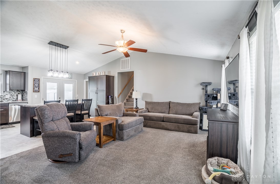 1442 Langdon Road Sidney, OH 45365 - Photo 7 of 34 This living room boasts high ceilings and an open-concept layout.