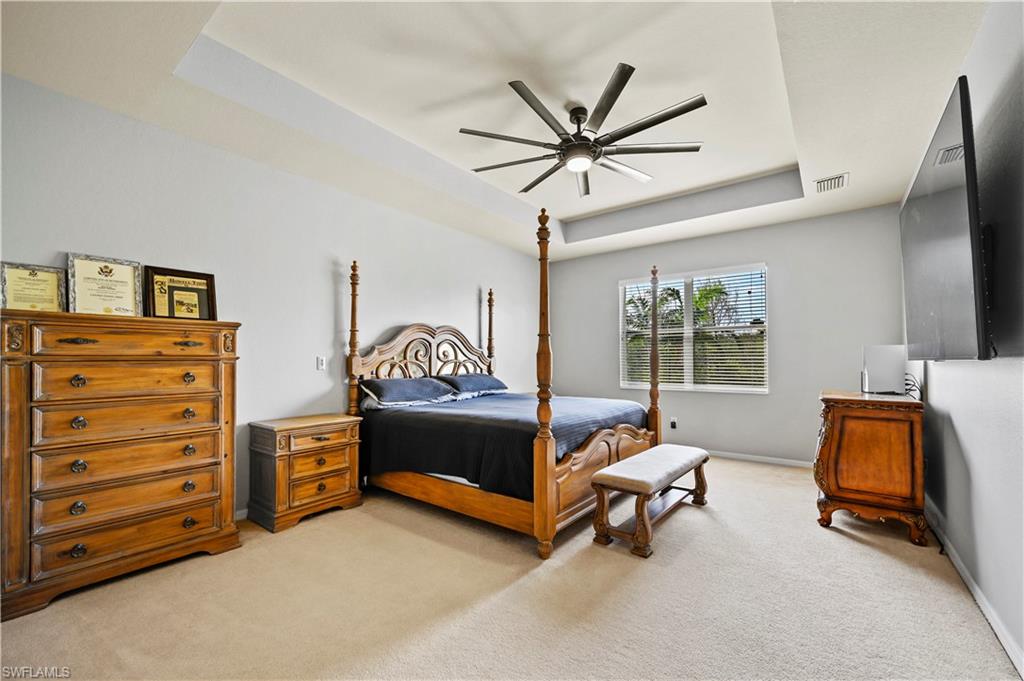 20686 Larino Loop Estero, FL 33928 - Photo 18 of 47 a bedroom with furniture and a window