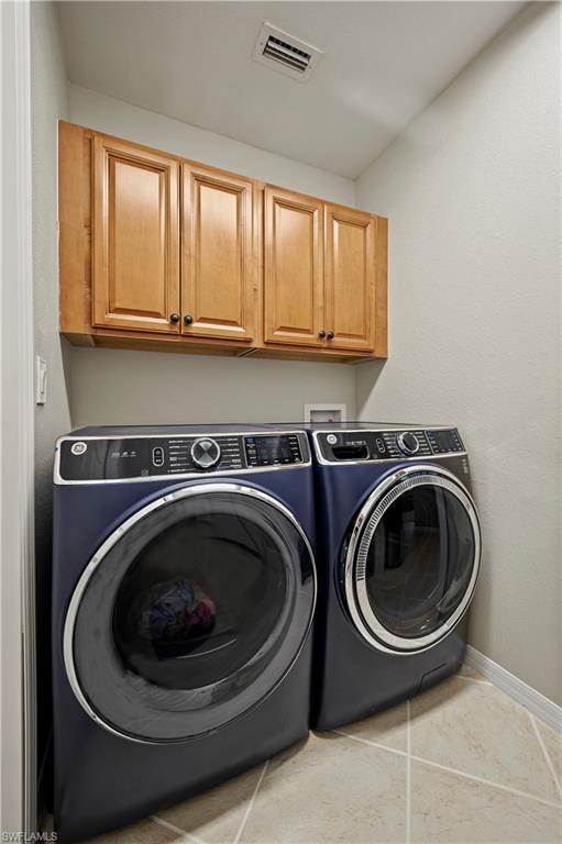 20686 Larino Loop Estero, FL 33928 - Photo 26 of 47 a utility room with sink dryer and washer