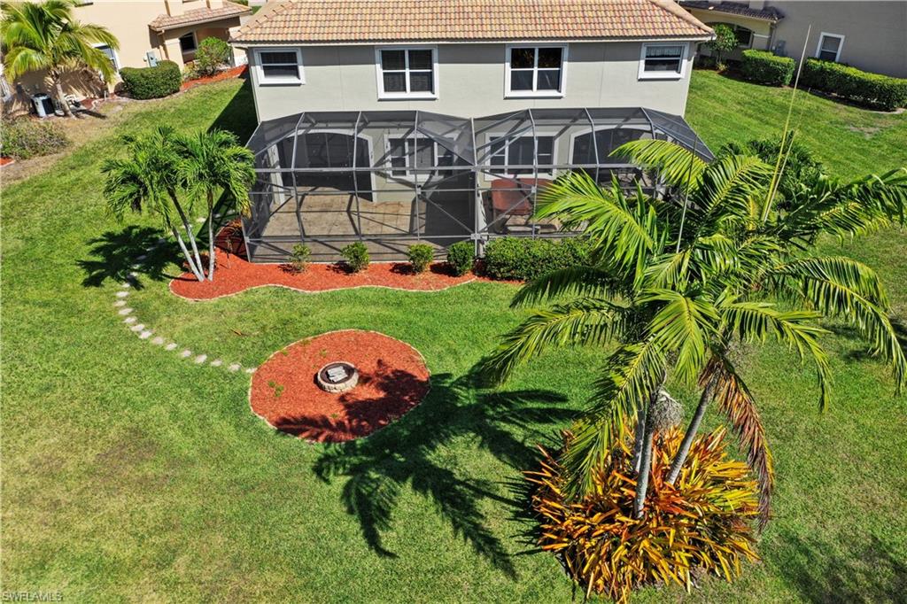 20686 Larino Loop Estero, FL 33928 - Photo 32 of 47 an aerial view of a house with swimming pool garden and patio