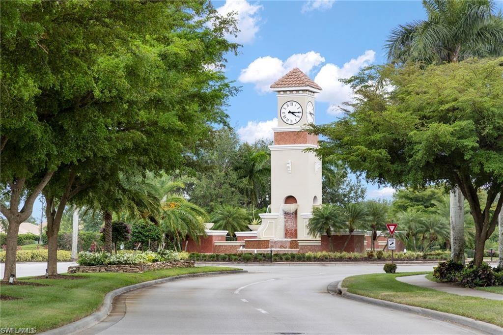 20686 Larino Loop Estero, FL 33928 - Photo 35 of 47 a view of a fountain in front of a house with a fountain