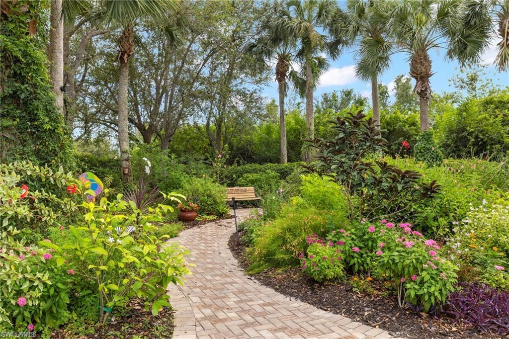 20686 Larino Loop Estero, FL 33928 - Photo 41 of 47 a view of a garden with plants