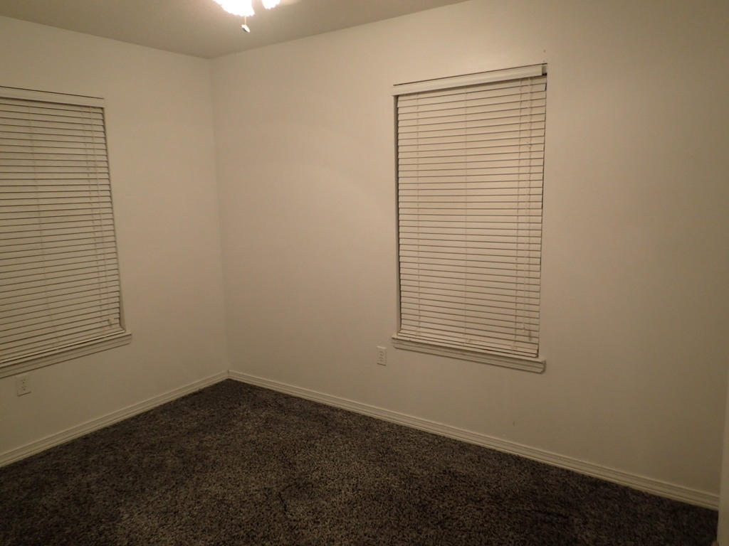 1046 Lighthouse Church Road Baker, FL 32531 - Photo 8 of 14 an empty room with a window