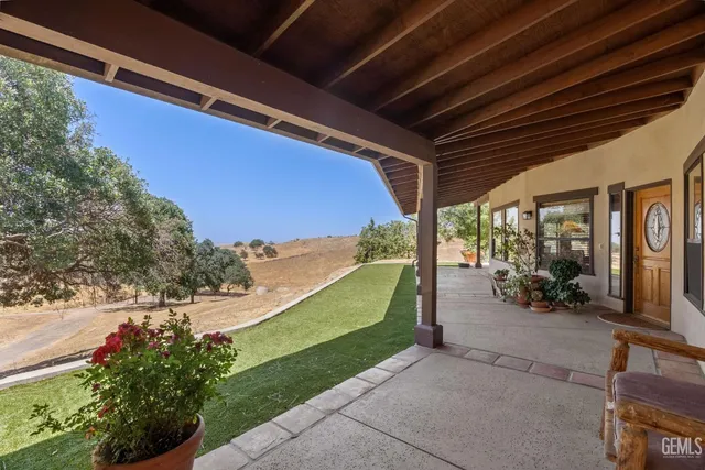 a view of a terrace with a garden