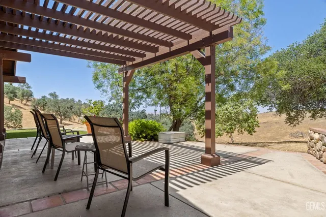 a view of a snow in the middle of a yard