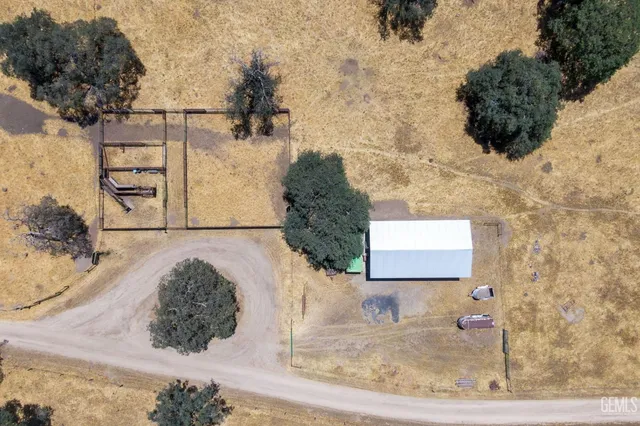 a view of kitchen with furniture and large window