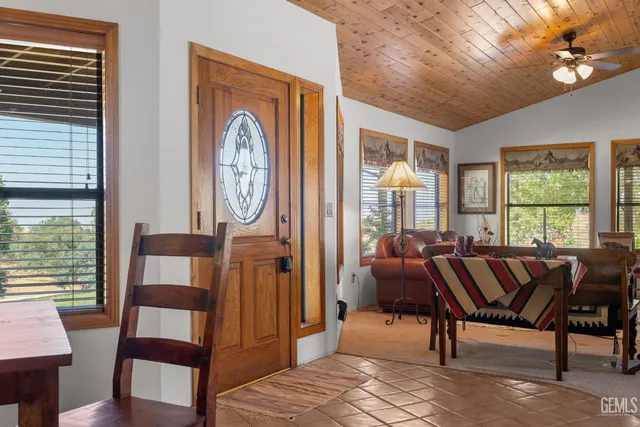 a view of a kitchen area with furniture and window