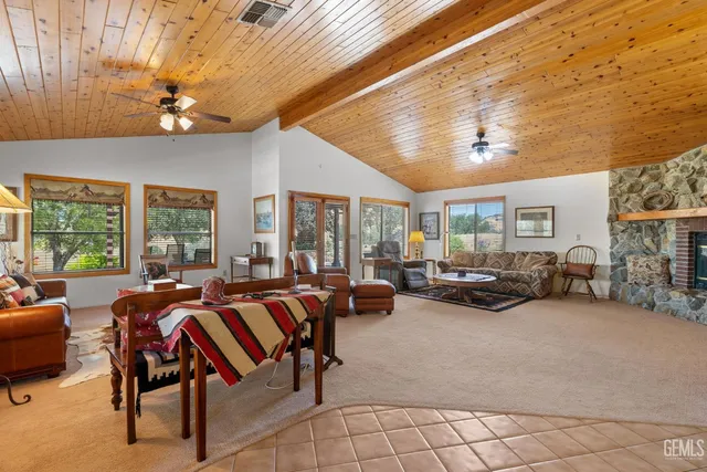 a kitchen with dining area table and chairs