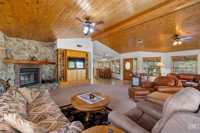 a bathroom with a double vanity sink mirror and next to a window