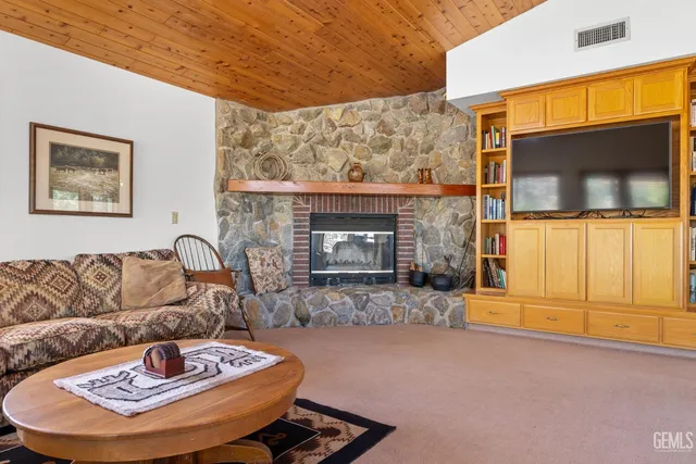 a bathroom with a window and a shower