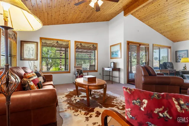 a bedroom with a bed a desk and chair