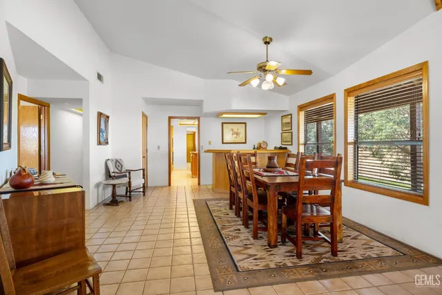 a picture of a bench in front of a building