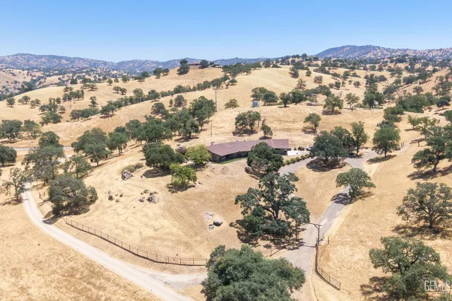a porch with a garden view