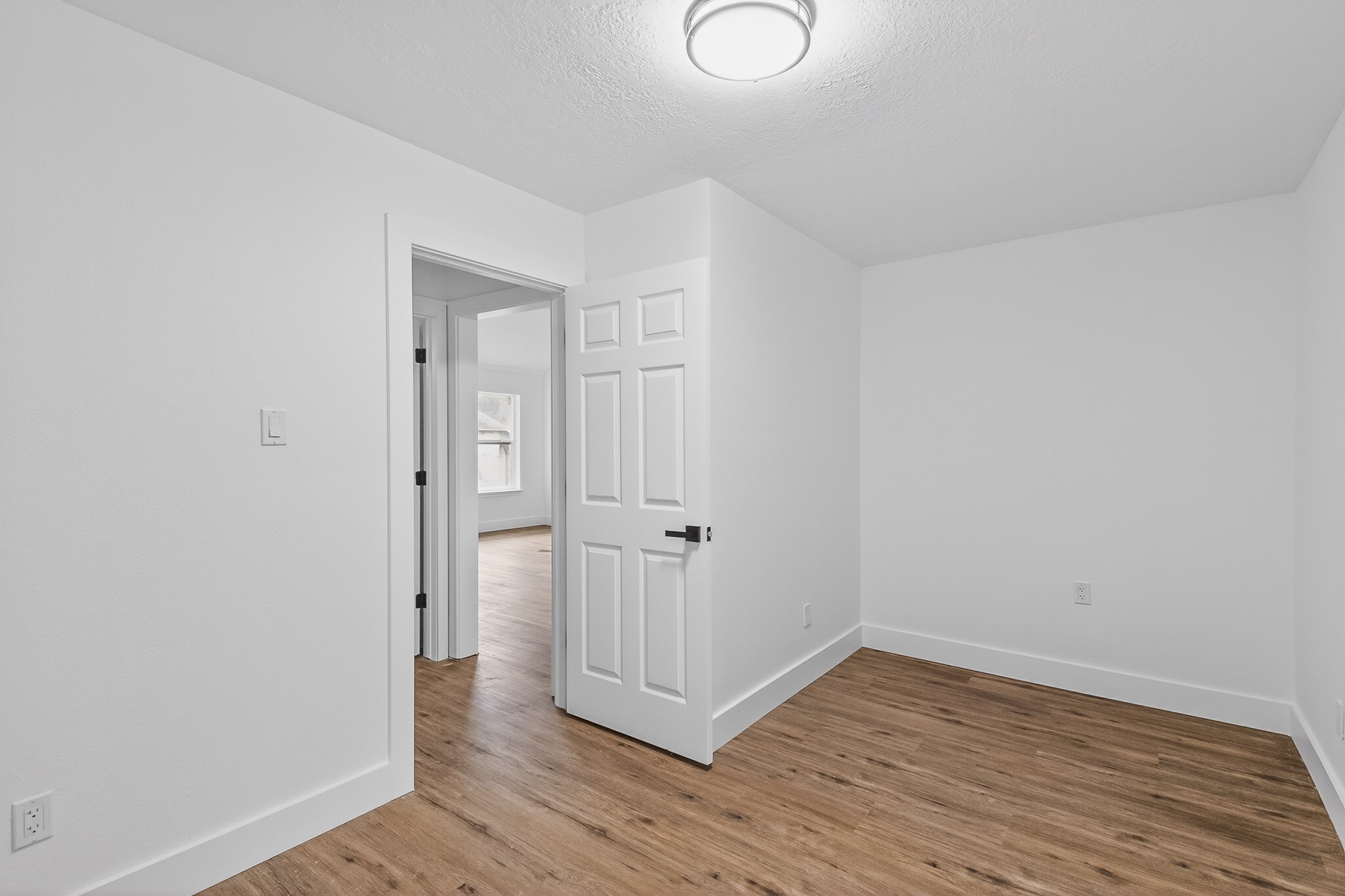 523 Rampart Lane Conroe, TX 77302 - Photo 33 of 41 A highly adaptable flex space designed to evolve with your lifestyle perfect as a private executive office, fitness studio, creative workspace, media lounge, or additional guest accommodations.