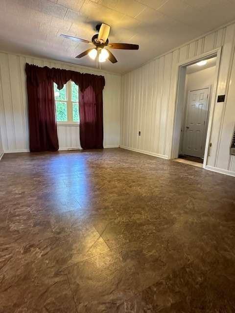 1323 Cavender Creek Road Dahlonega, GA 30533 - Photo 17 of 56 an empty room with windows and fan