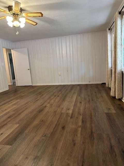 1323 Cavender Creek Road Dahlonega, GA 30533 - Photo 18 of 56 an empty room with wooden floor closet and windows