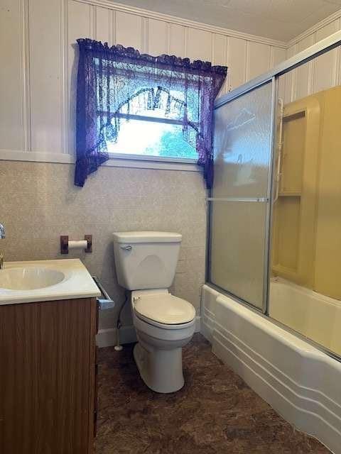 1323 Cavender Creek Road Dahlonega, GA 30533 - Photo 23 of 56 a bathroom with a toilet sink and shower