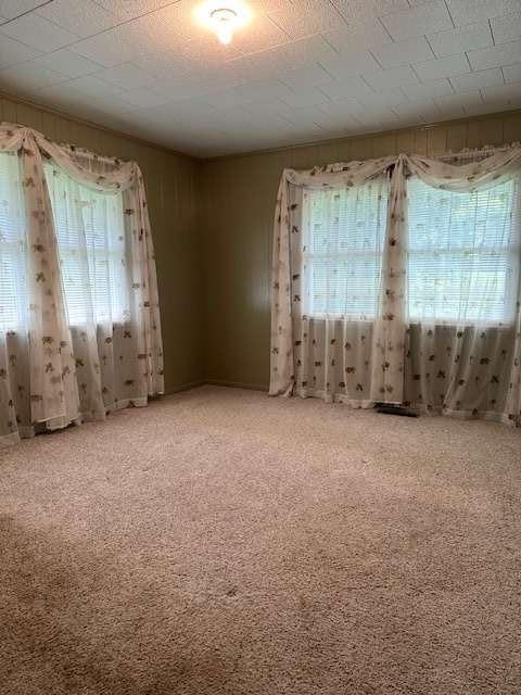 1323 Cavender Creek Road Dahlonega, GA 30533 - Photo 25 of 56 a view of an empty room with a window