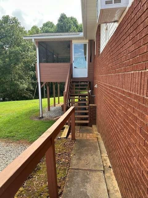1323 Cavender Creek Road Dahlonega, GA 30533 - Photo 47 of 56 a view of house with backyard and pool
