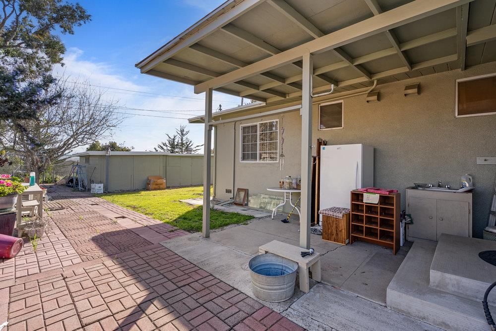 718 Meadow Drive Salinas, CA 93905 - Photo 11 of 14 a view of a backyard with swimming pool