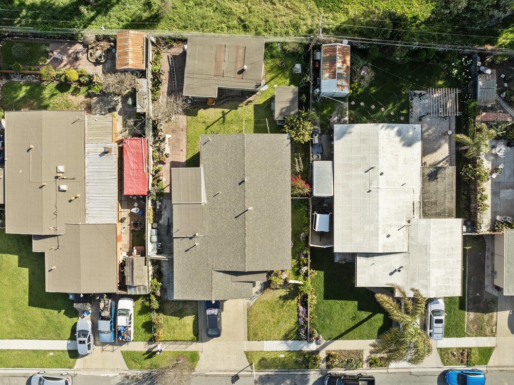 718 Meadow Drive Salinas, CA 93905 - Photo 14 of 14 an aerial view of residential houses with outdoor space and parking