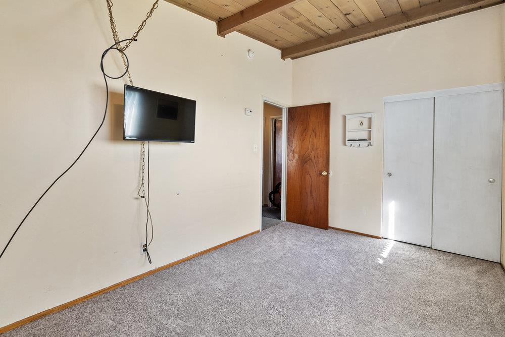 718 Meadow Drive Salinas, CA 93905 - Photo 7 of 14 a view of an empty room with wooden floor and windows
