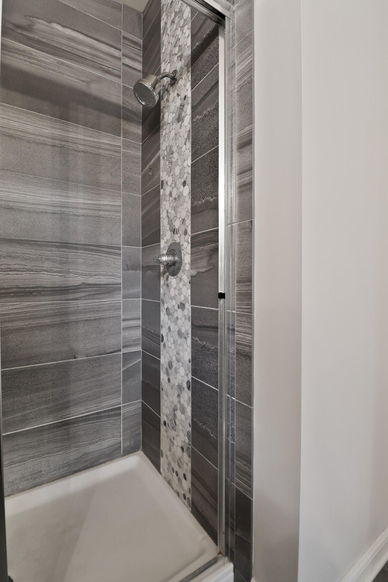 10188 Azalea Drive Crown Point, IN 46307 - Photo 16 of 29 a bathroom with a shower