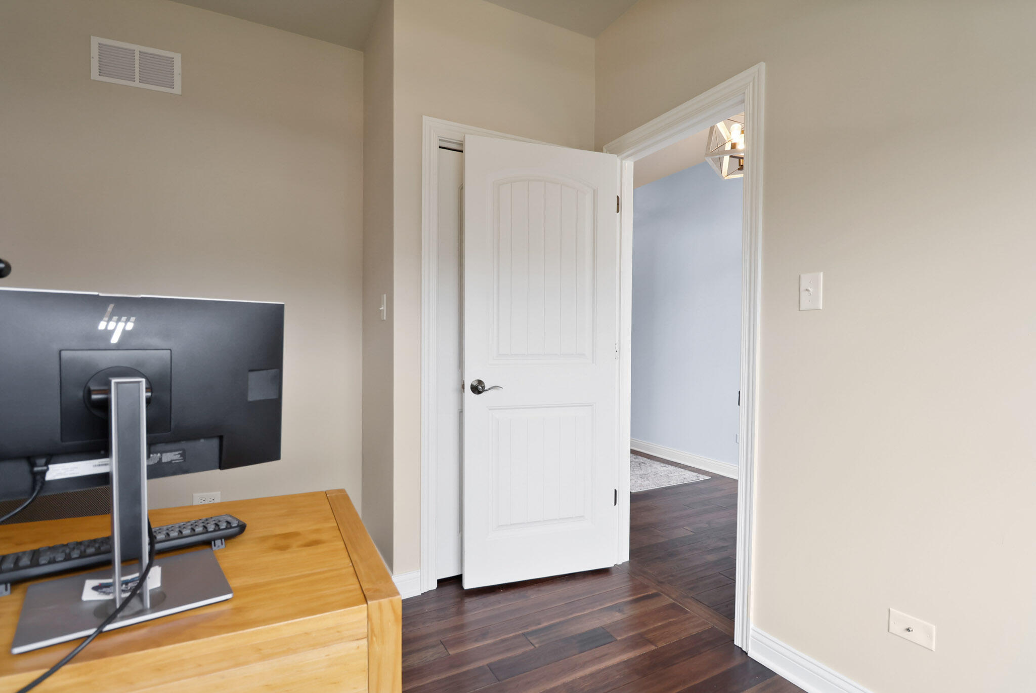 10188 Azalea Drive Crown Point, IN 46307 - Photo 20 of 29 a view of a hallway with wooden floor
