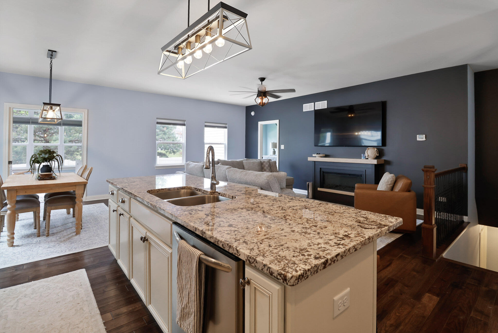 10188 Azalea Drive Crown Point, IN 46307 - Photo 2 of 29 a open kitchen with stainless steel appliances granite countertop a kitchen island a stove and a sink