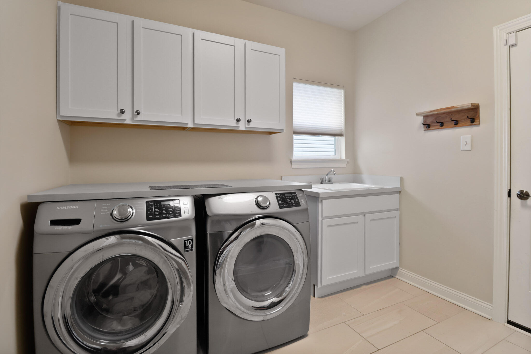 10188 Azalea Drive Crown Point, IN 46307 - Photo 24 of 29 a utility room with dryer and washer