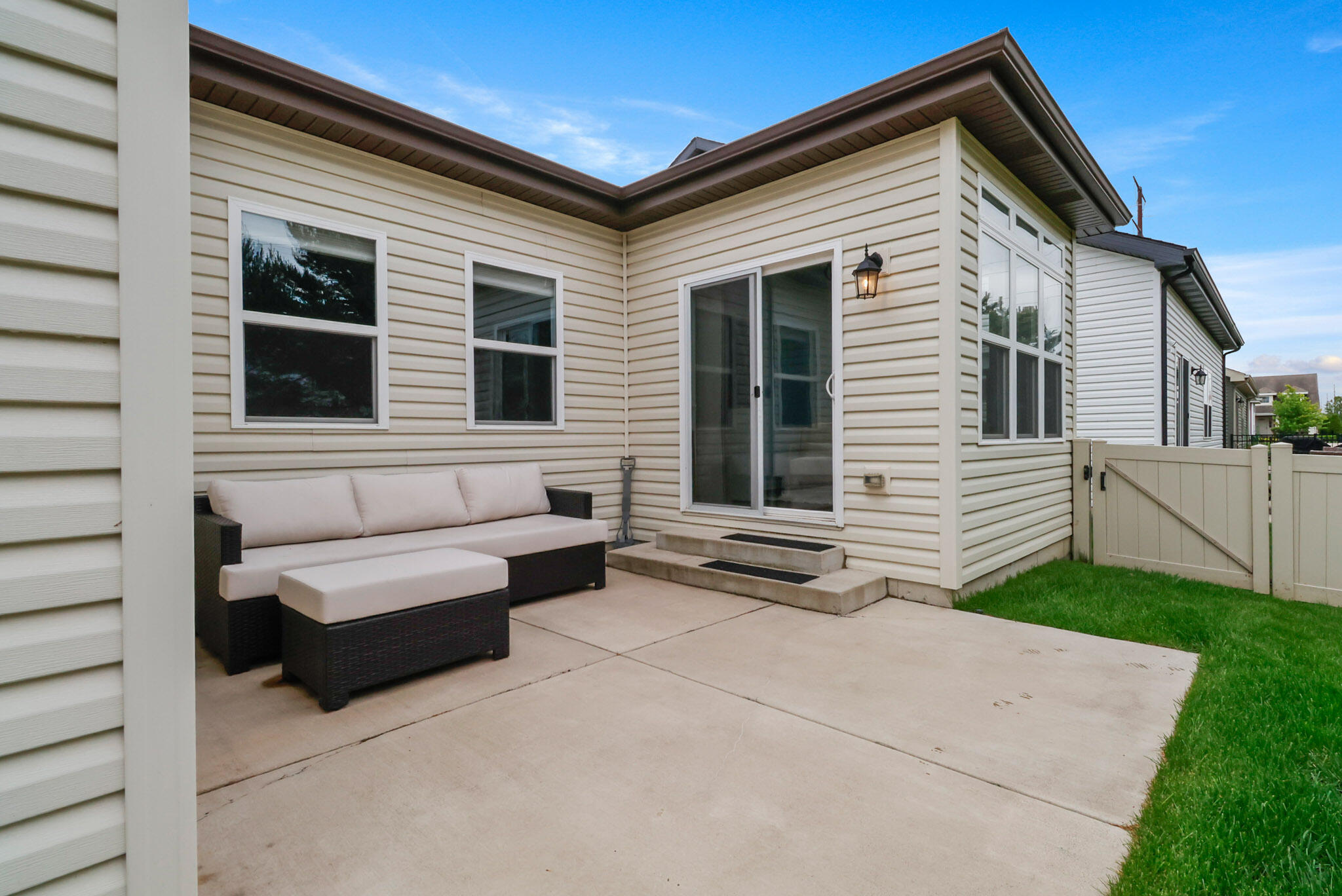 10188 Azalea Drive Crown Point, IN 46307 - Photo 28 of 29 a view of house with backyard and a car