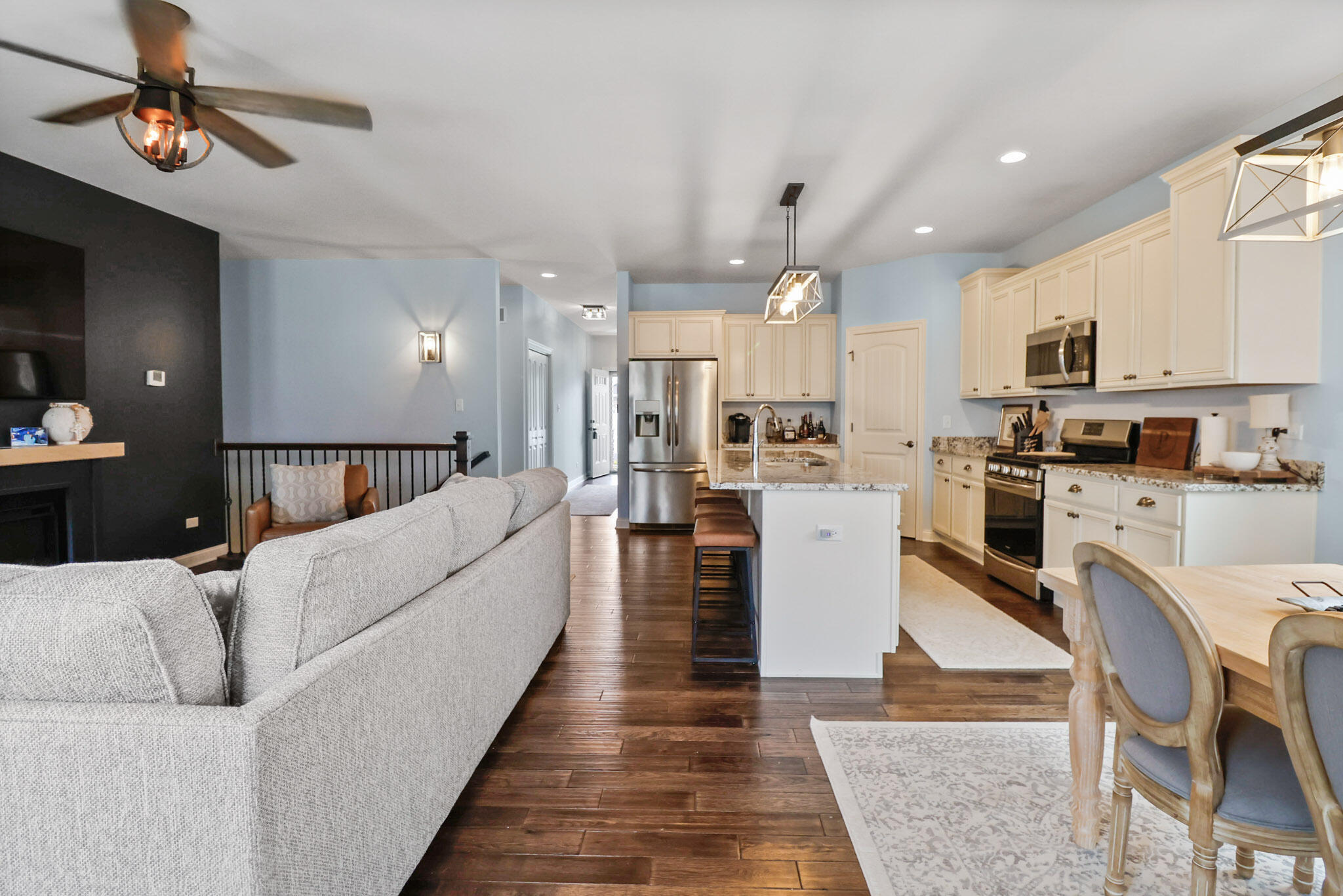10188 Azalea Drive Crown Point, IN 46307 - Photo 4 of 29 a living room with stainless steel appliances furniture and a view of kitchen