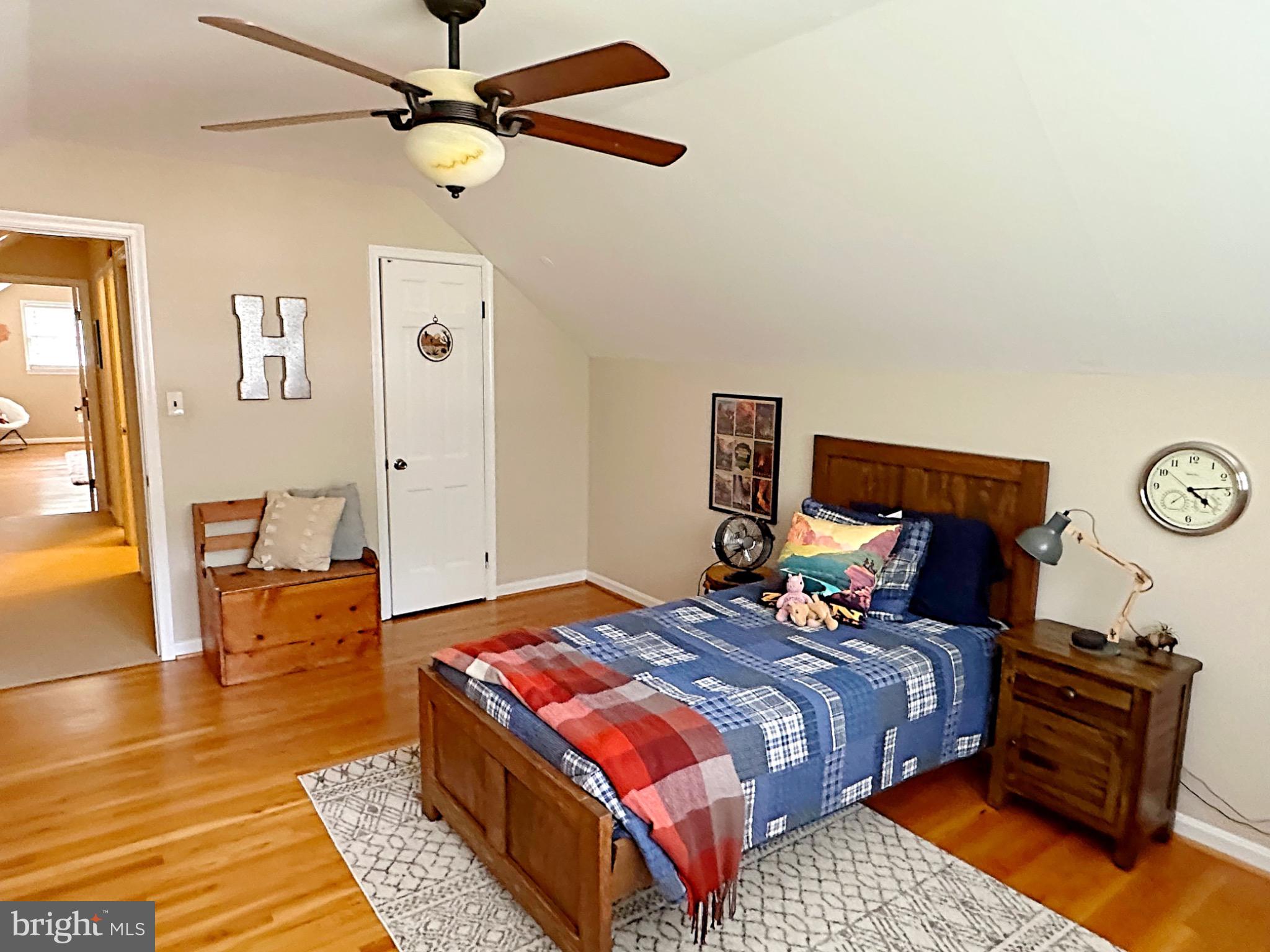 422 Old Courthouse Road Northeast Vienna, VA 22180 - Photo 19 of 25 Cozy attic bedroom with charming details.