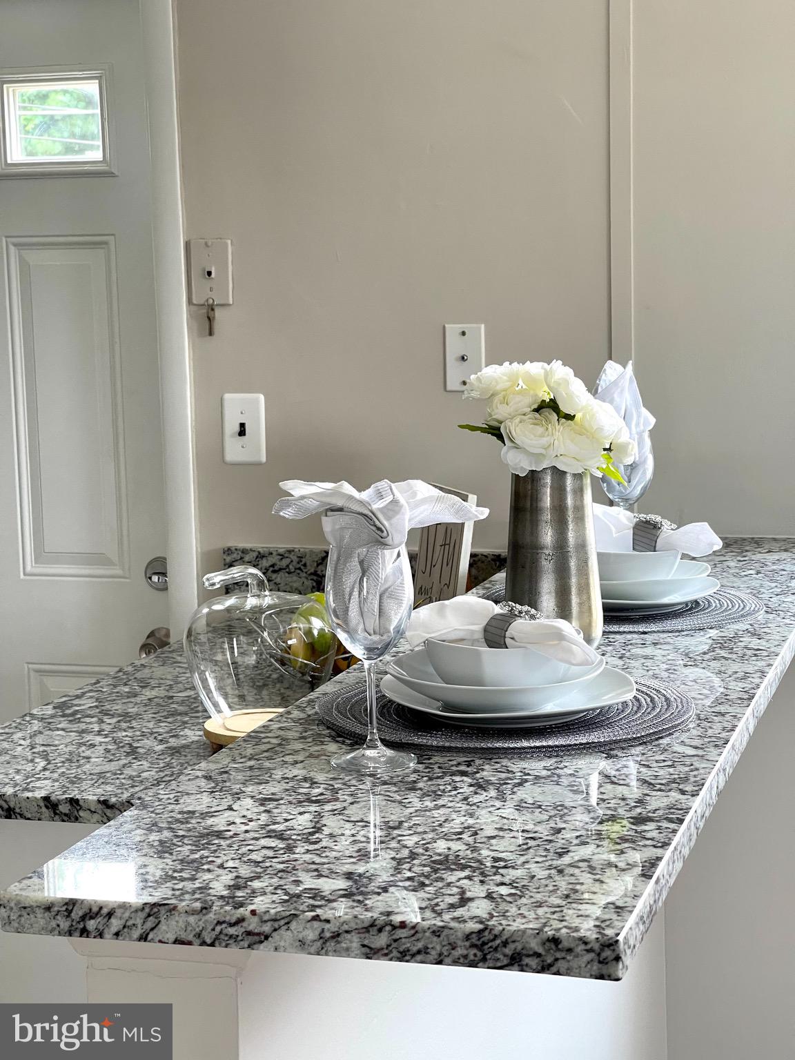 6934 Blanche Road Baltimore, MD 21215 - Photo 12 of 51 Breakfast bar with granite counter.