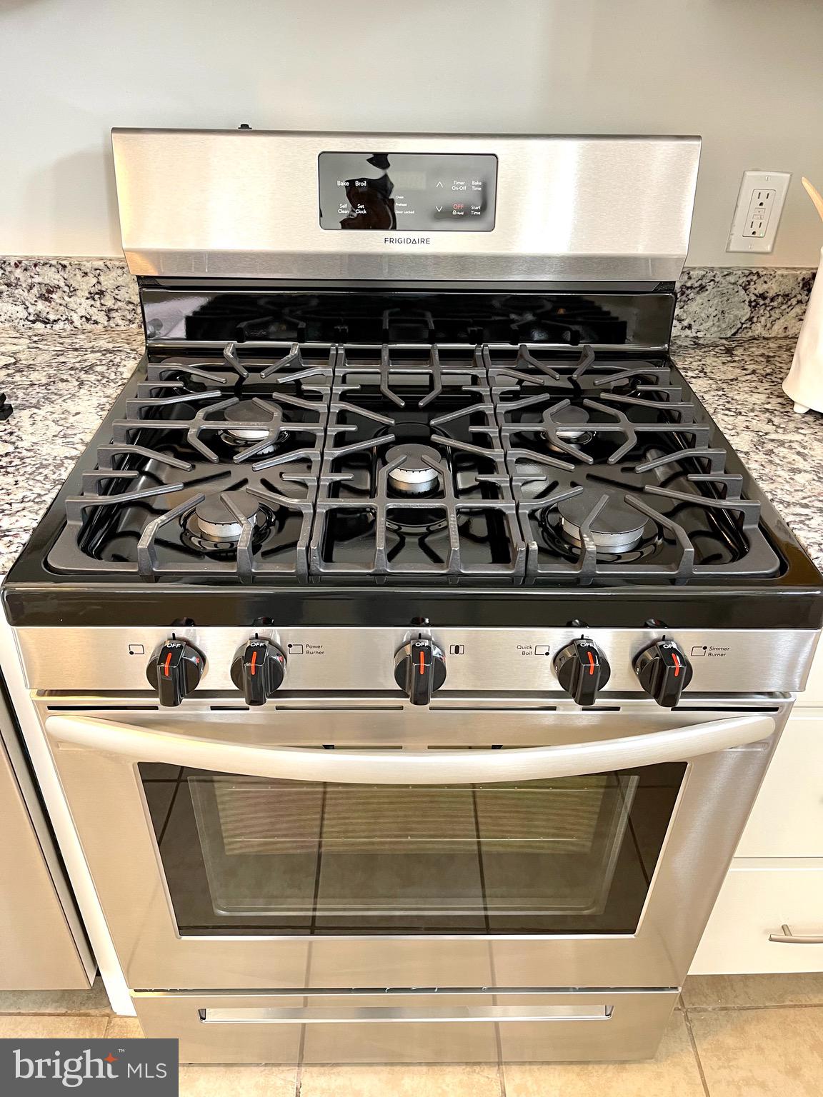 6934 Blanche Road Baltimore, MD 21215 - Photo 3 of 51 Enjoy cooking on your 5 burner stove.